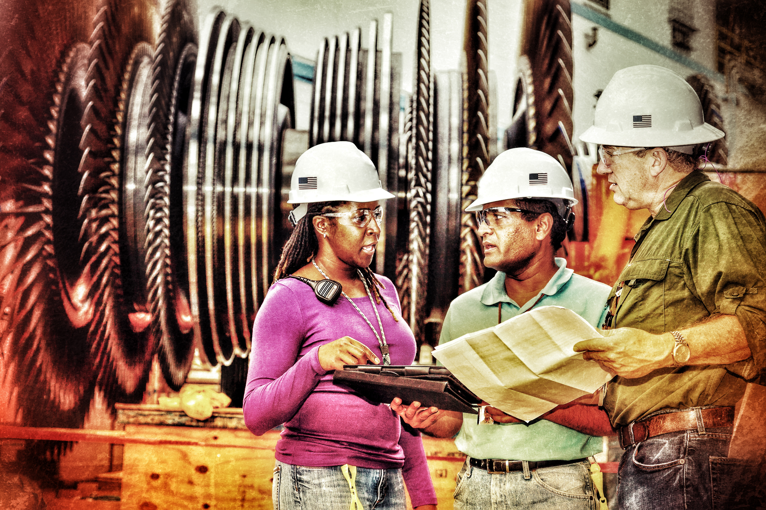 People make the world go around! These engineers, and trades People all make this world a little better and safer. Turbine in background