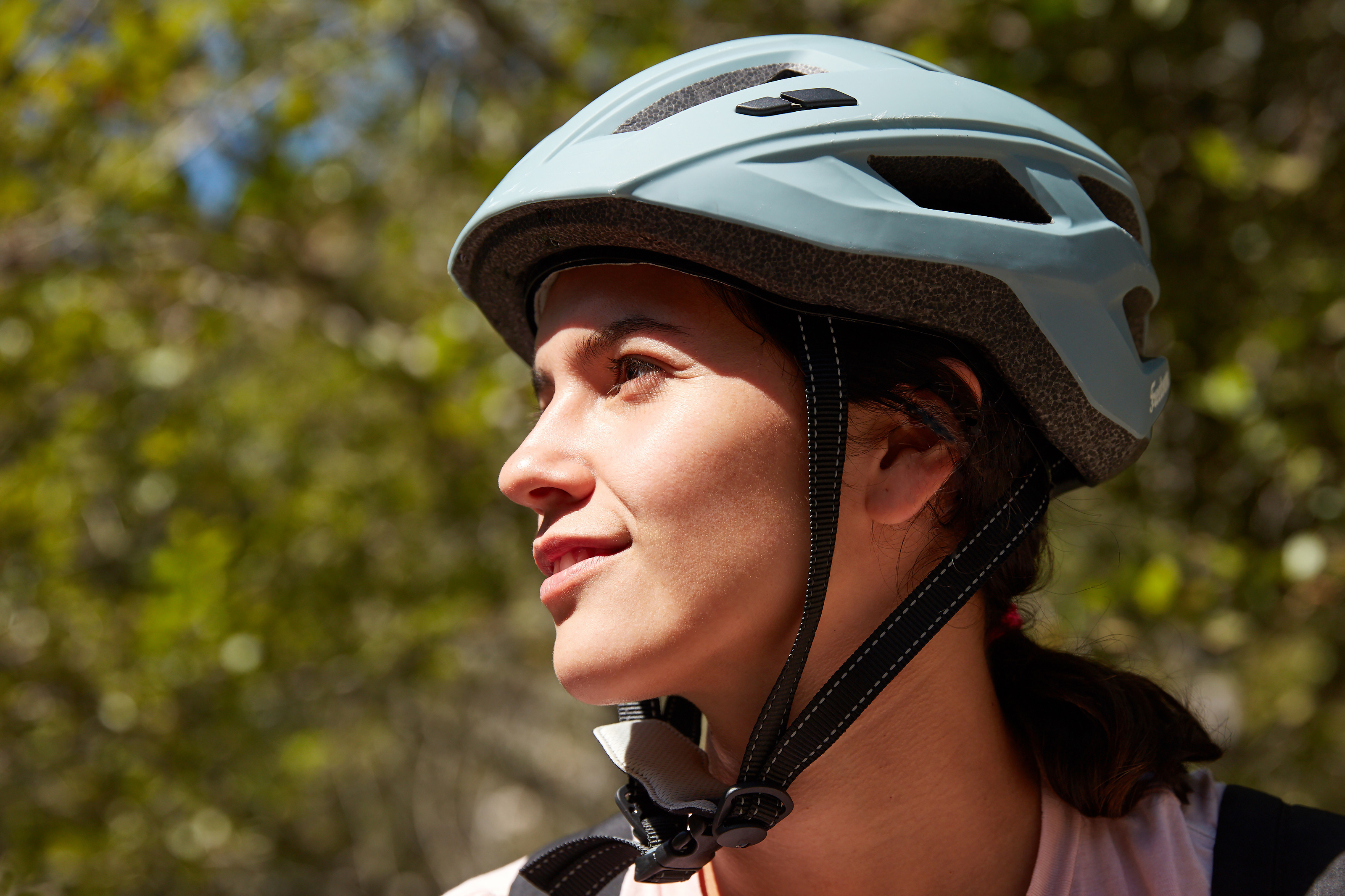 Portrait of woman wearing helmut.