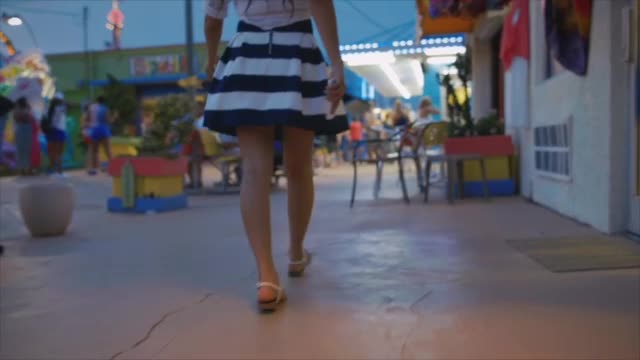 motion clips of fun fashionable young women and high energy young couple outside on location, in field, at beach, and young man in modern loft, young women on cyc sweep, young man on white background.  mix of slider, handheld, and movi shots 