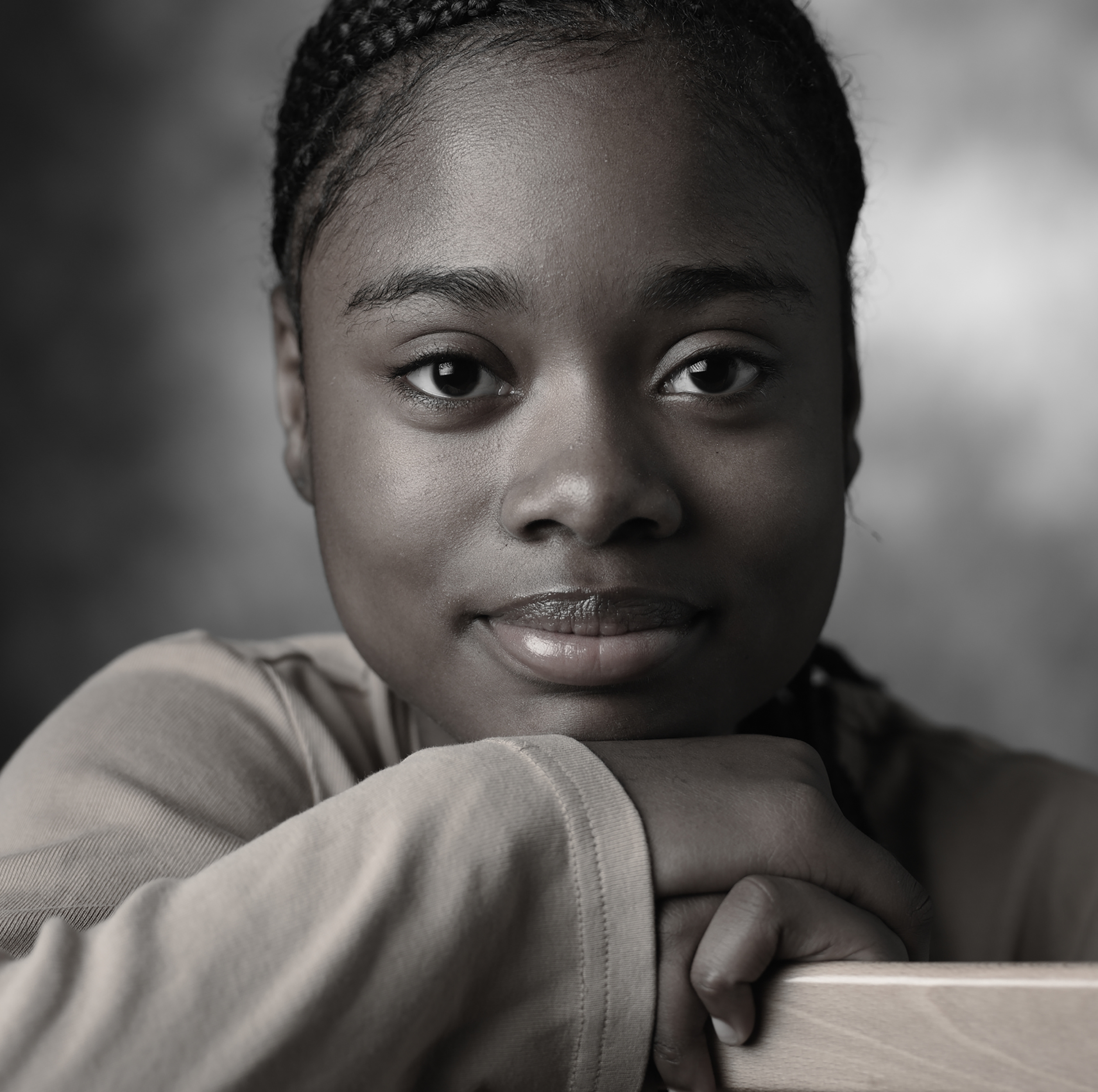 Portrait of african american woman looking confidently at camera for education publication, soft color and lighting