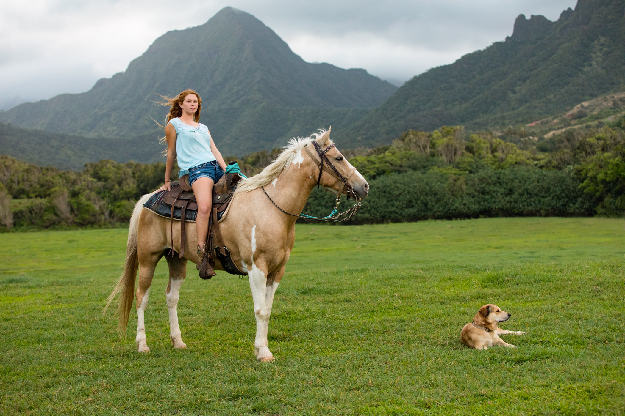 Portrait of a girl and her horse at Kualoa Ranch, Oahu, Hawaii.