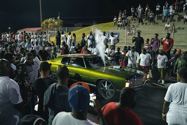 DONK purging nitrous around a crowd at a drag race