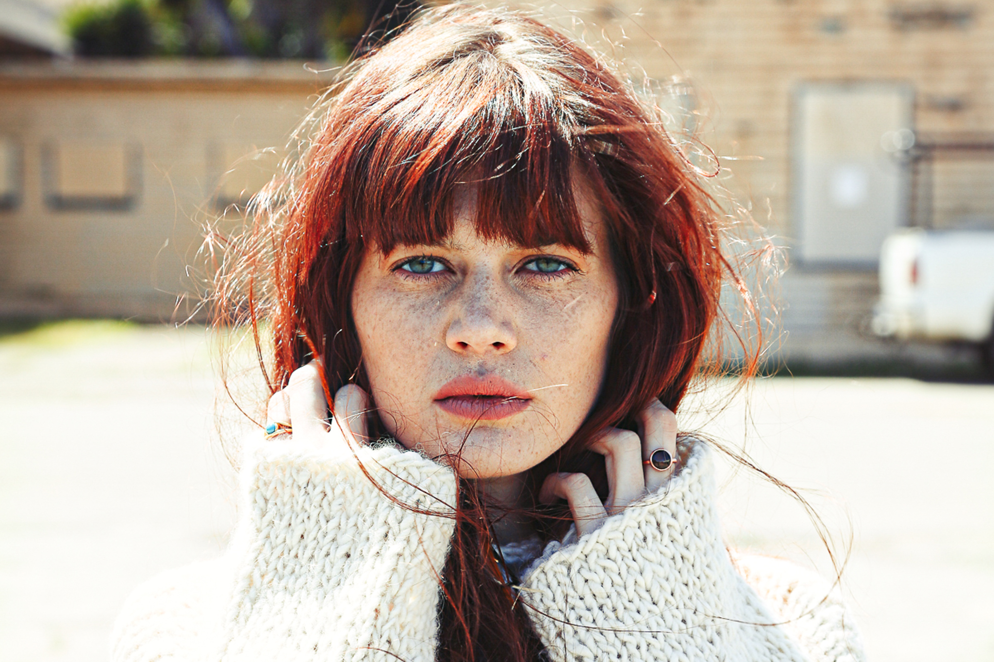 Portrait of a red haired girl with freckles shot on Treasure Island in San Francisco.